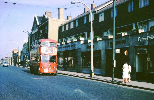 Red trolleybus no. 657 heading towards Hounslow