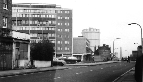 Black & white photo, view of a rectangular block of flats