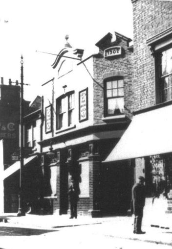 Brick built pub on corner, date plaque 1902