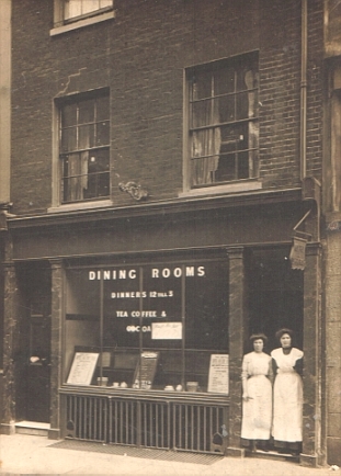 'Dining Rooms' with two waitresses standing in the doorway