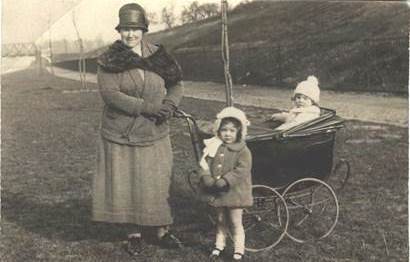 Emily Alice Beardsworth with baby in pram and another youngster