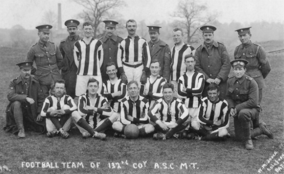 Football team and men in army uniform